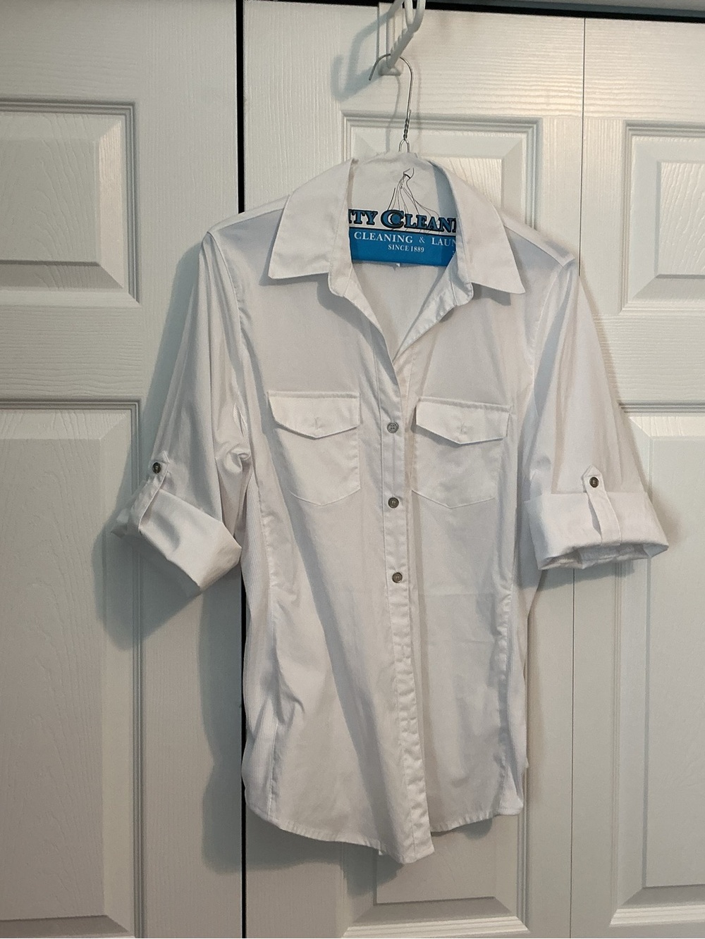 Classic White woman’s Button-Up Shirt with Roll-Tab Sleeves